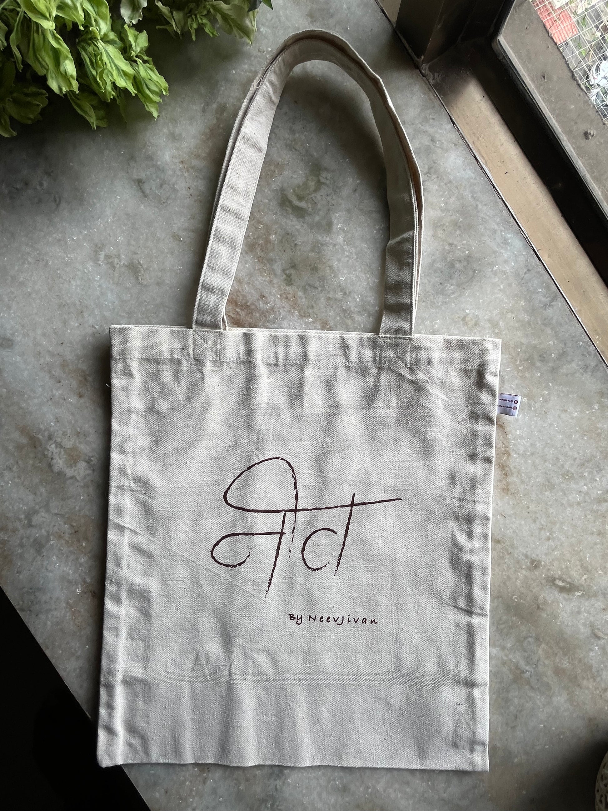 Cotton tote bag being carried